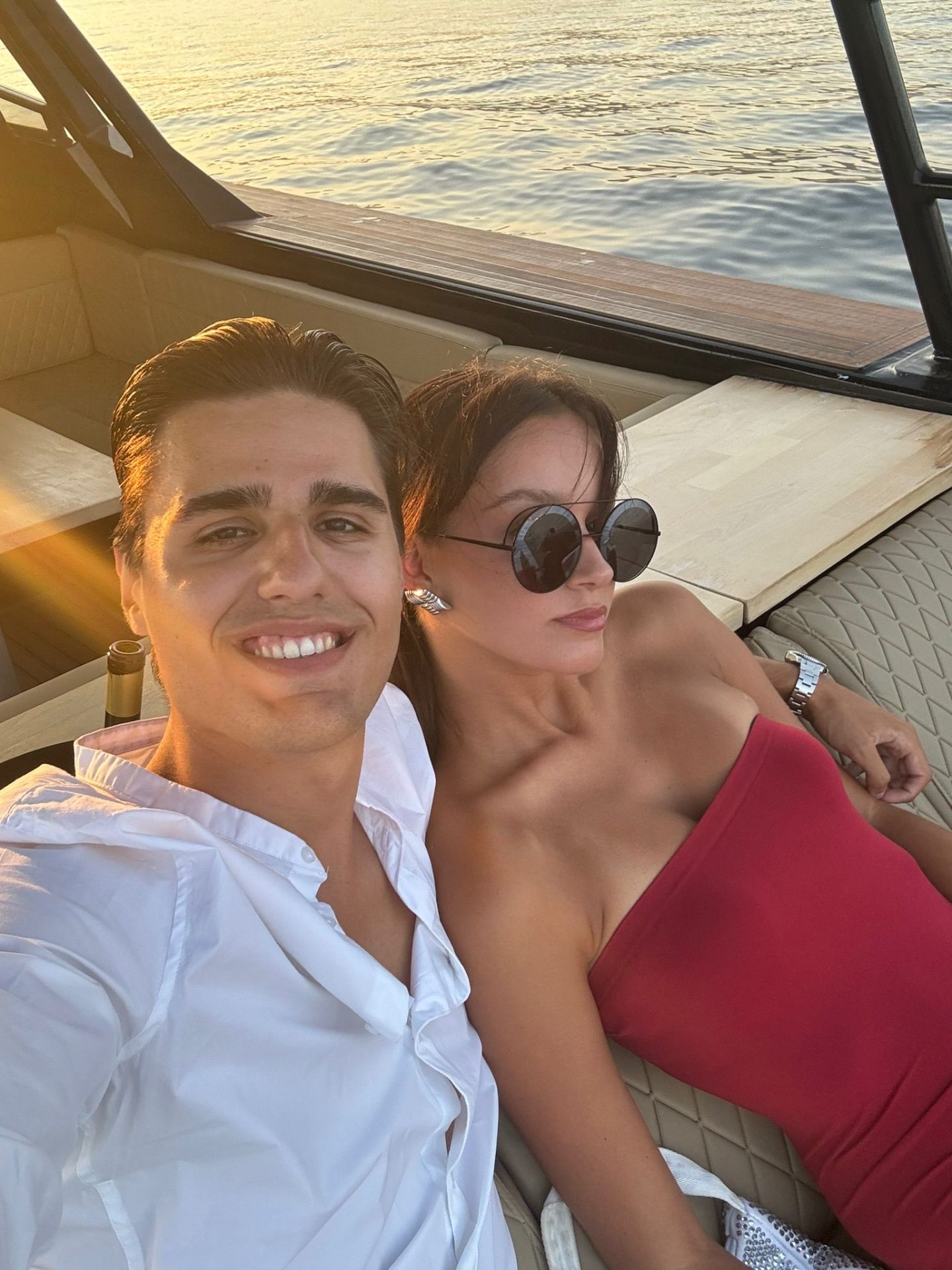 Ivan and Dorothea on a boat at sunset