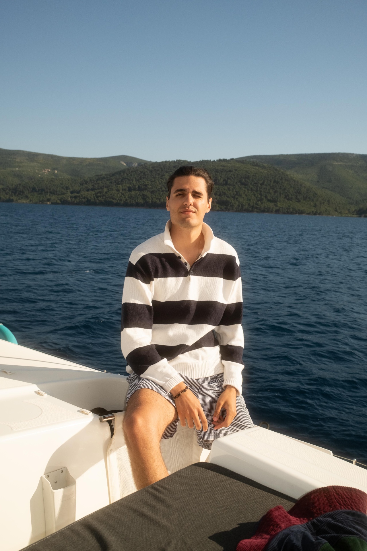 Ivan on a boat in the Croatian islands